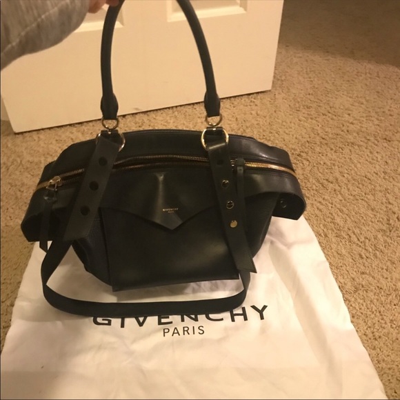 Givenchy Handbags - Givenchy 100% calf. Sway black bag..